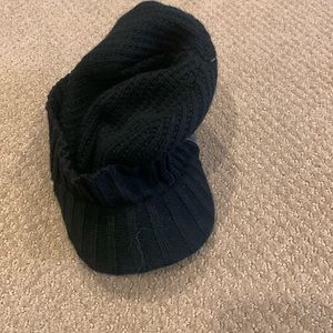 North Face black knit winter cap with visor.
